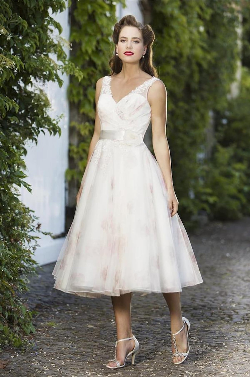 Front view of Flossie Bridal Gown with satin belt.